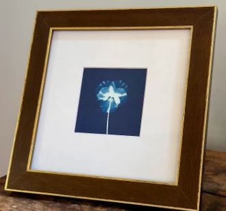 4"x4"and 5"x5" prints in 8"x8" frame